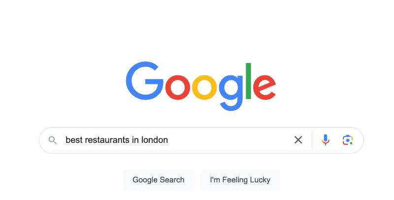 Explicit local keywords: Specify the search location in the query – eg: “restaurant london”.